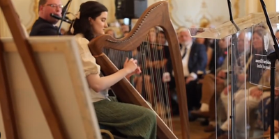 Tara Viscardi playing harp at Embassy of Ireland London