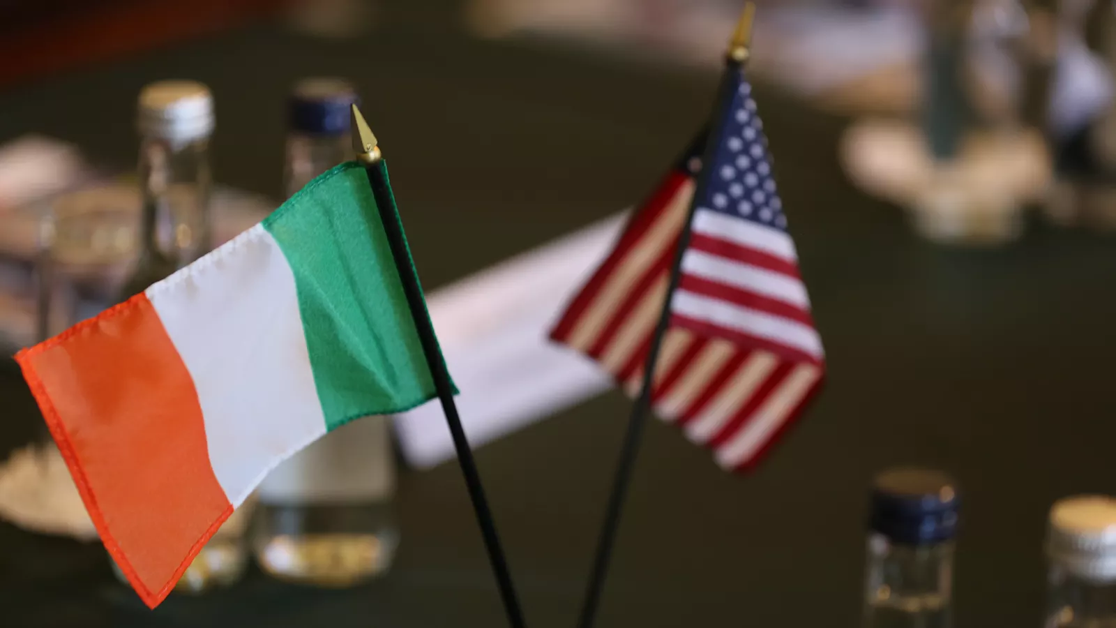 irish and american flags on a table